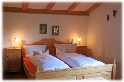 Ein Bett oder Betten in einem Zimmer der Unterkunft Ferienapartment Haus Raith