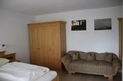 Ein Bett oder Betten in einem Zimmer der Unterkunft Bucherhof