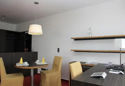 Ein Sitzbereich in der Unterkunft Hotel Gästehaus Forum am Westkreuz
