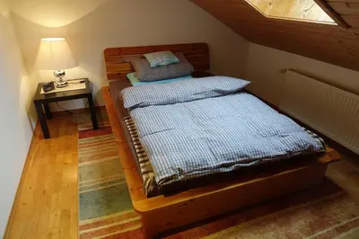 Ein Bett oder Betten in einem Zimmer der Unterkunft Haus Riegseeblick