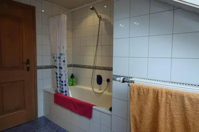 Ein Badezimmer in der Unterkunft Haus Riegseeblick