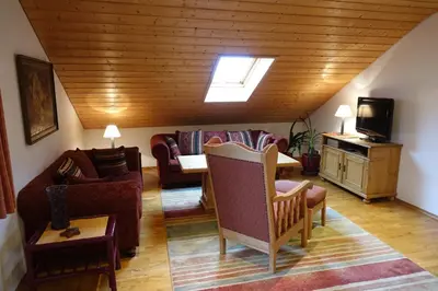 Ein Sitzbereich in der Unterkunft Haus Riegseeblick
