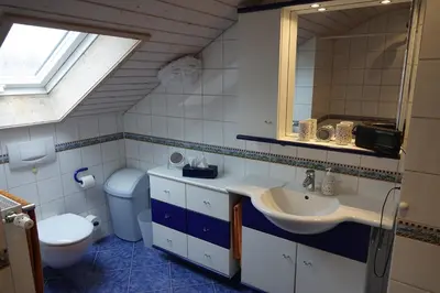 Ein Badezimmer in der Unterkunft Haus Riegseeblick