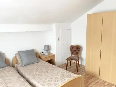 Ein Bett oder Betten in einem Zimmer der Unterkunft Bavarian Holiday Home - A94 Autobahn