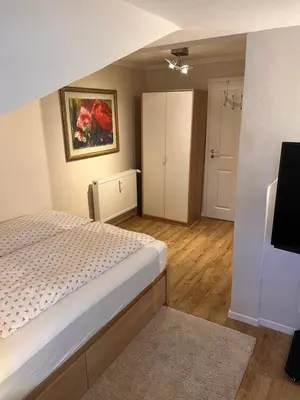 Ein Bett oder Betten in einem Zimmer der Unterkunft Ferienwohnung Giacomelli 2