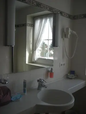 Ein Badezimmer in der Unterkunft Hotel-Gasthof Maisberger