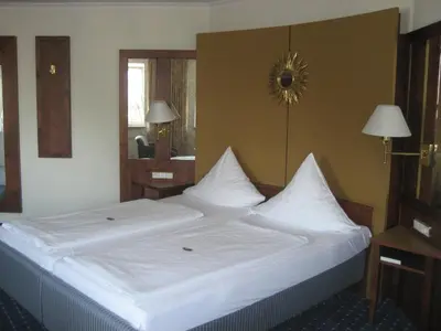 Ein Bett oder Betten in einem Zimmer der Unterkunft Hotel-Gasthof Maisberger