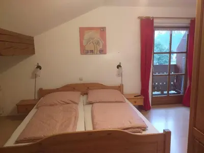 Ein Bett oder Betten in einem Zimmer der Unterkunft Paulhuberhof