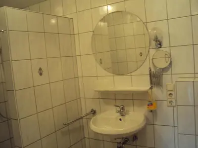 Ein Badezimmer in der Unterkunft Paulhuberhof