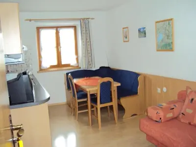 Ein Sitzbereich in der Unterkunft Paulhuberhof