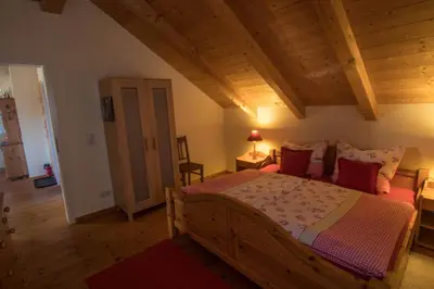 Ein Bett oder Betten in einem Zimmer der Unterkunft Ferienwohnung Amato