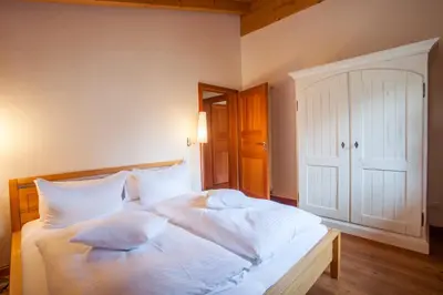 Ein Bett oder Betten in einem Zimmer der Unterkunft Haus am Katzenbach