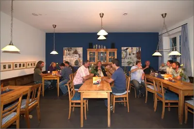 Ein Restaurant oder anderes Speiselokal in der Unterkunft Altstadthotel Bauern Bräu Schrobenhausen