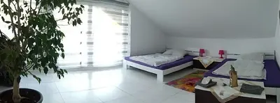 Ein Bett oder Betten in einem Zimmer der Unterkunft Ferienwohnung