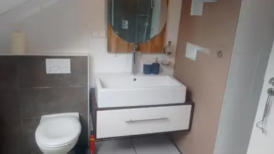 Ein Badezimmer in der Unterkunft Ferienwohnung