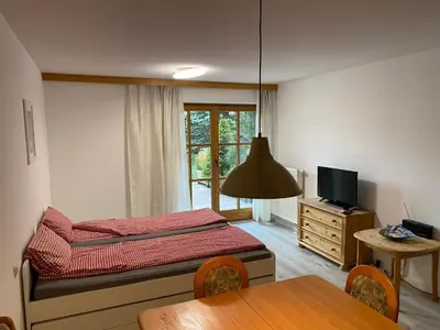 Ein Bett oder Betten in einem Zimmer der Unterkunft Haus Rottachbrücke May