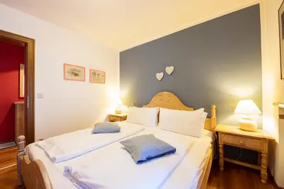 Ein Bett oder Betten in einem Zimmer der Unterkunft Kleeblatt