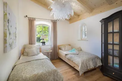 Ein Bett oder Betten in einem Zimmer der Unterkunft Ferienwohnung Chiemsee