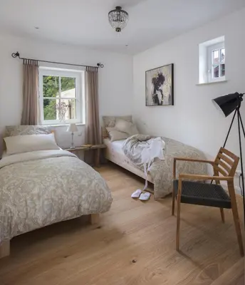 Ein Bett oder Betten in einem Zimmer der Unterkunft Ferienwohnung Chiemsee