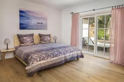 Ein Bett oder Betten in einem Zimmer der Unterkunft Ferienwohnung Chiemsee
