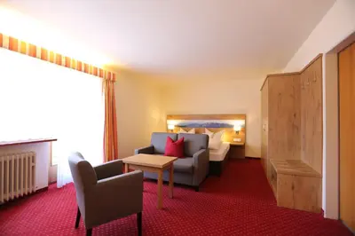 Ein Sitzbereich in der Unterkunft Gästehaus Heimgarten