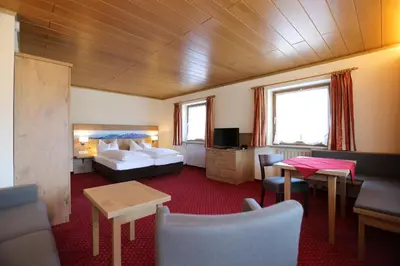 Ein Bett oder Betten in einem Zimmer der Unterkunft Gästehaus Heimgarten