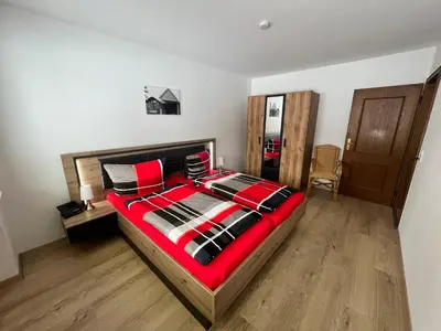 Ein Bett oder Betten in einem Zimmer der Unterkunft Ferienwohnung Strohmeyer
