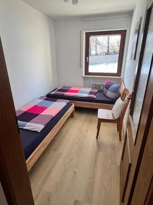 Ein Bett oder Betten in einem Zimmer der Unterkunft Ferienwohnung Strohmeyer