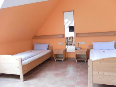 Ein Bett oder Betten in einem Zimmer der Unterkunft Landgasthof Asum