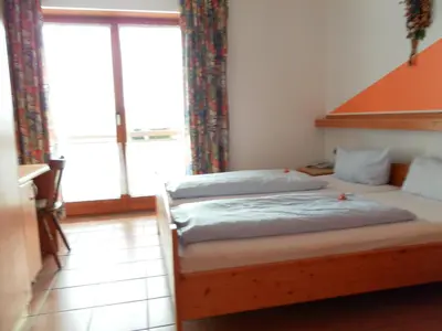 Ein Bett oder Betten in einem Zimmer der Unterkunft Landgasthof Asum