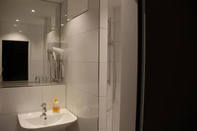 Ein Badezimmer in der Unterkunft Gasthof Zur Post