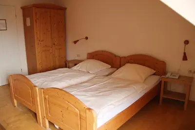 Ein Bett oder Betten in einem Zimmer der Unterkunft Gasthof Zur Post