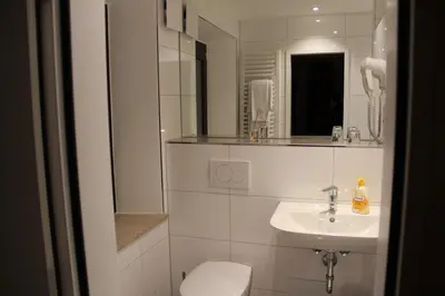 Ein Badezimmer in der Unterkunft Gasthof Zur Post
