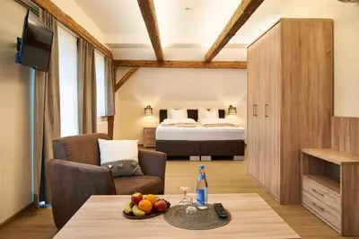 Ein Bett oder Betten in einem Zimmer der Unterkunft Gasthof Gigl