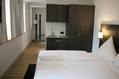 Ein Bett oder Betten in einem Zimmer der Unterkunft MO Hotel by WMM Hotels
