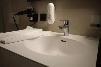 Ein Badezimmer in der Unterkunft MO Hotel by WMM Hotels