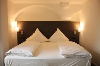 Ein Bett oder Betten in einem Zimmer der Unterkunft MO Hotel by WMM Hotels