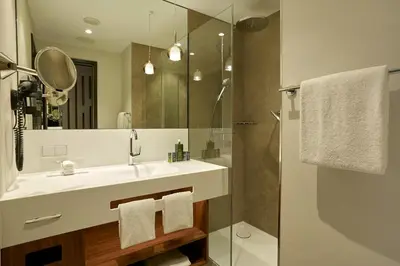 Ein Badezimmer in der Unterkunft HYPERION Hotel München
