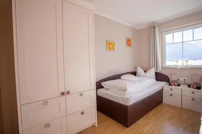 Ein Bett oder Betten in einem Zimmer der Unterkunft Hochgefühl