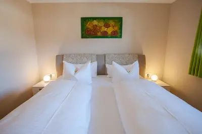 Ein Bett oder Betten in einem Zimmer der Unterkunft Hochgefühl