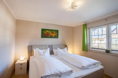 Ein Bett oder Betten in einem Zimmer der Unterkunft Hochgefühl