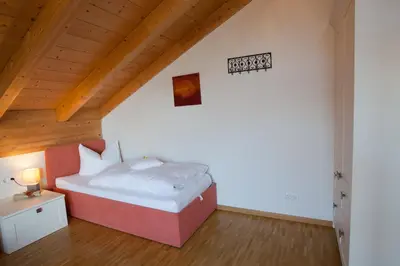 Ein Bett oder Betten in einem Zimmer der Unterkunft Rundblick