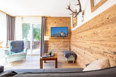 Ein Sitzbereich in der Unterkunft Alpennest