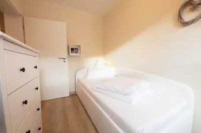Ein Bett oder Betten in einem Zimmer der Unterkunft Alpennest