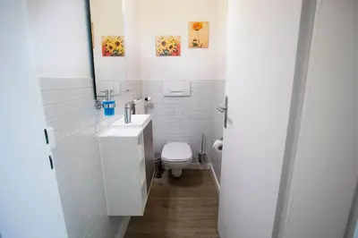 Ein Badezimmer in der Unterkunft Olympia
