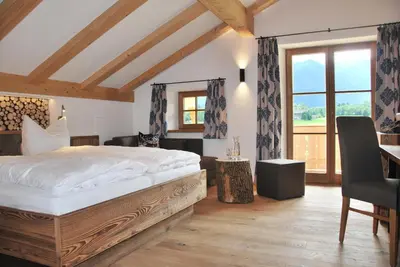 Ein Bett oder Betten in einem Zimmer der Unterkunft s´Quartier am Schliersee