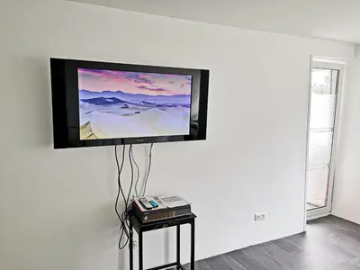 TV/Unterhaltungsangebot in der Unterkunft Business Apartment VAT Invoice Near Metro