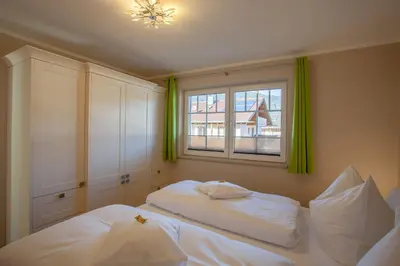 Ein Bett oder Betten in einem Zimmer der Unterkunft Hochstimmung