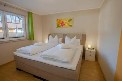 Ein Bett oder Betten in einem Zimmer der Unterkunft Hochstimmung