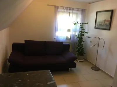 Ein Sitzbereich in der Unterkunft Augsburg-Bergheim E.